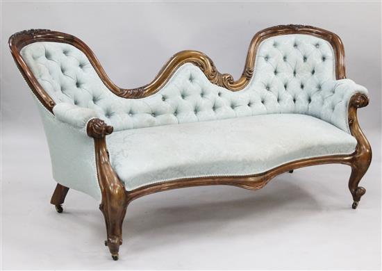 A Victorian double chair back settee,